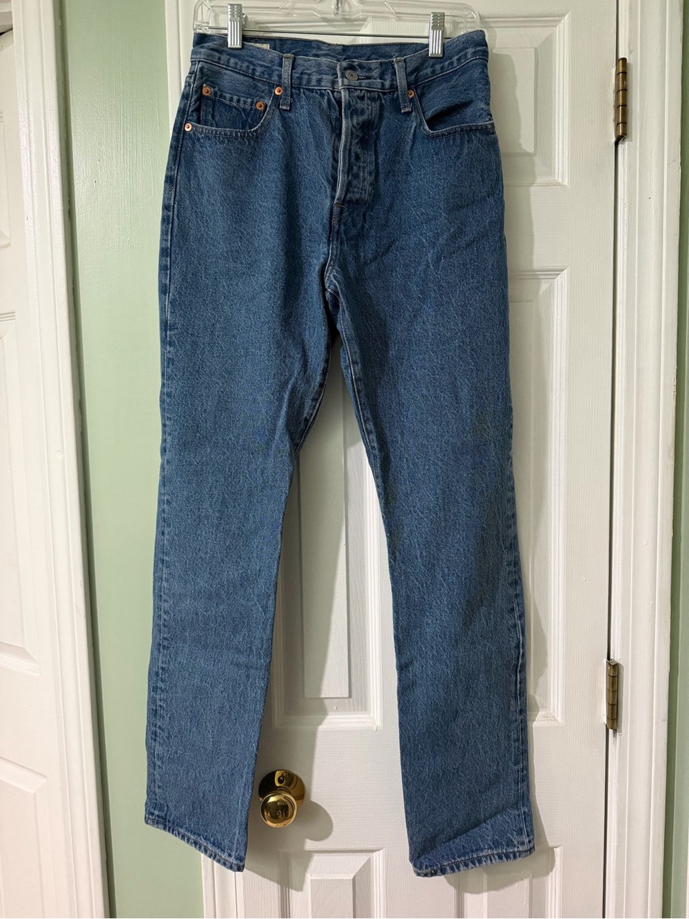 Levi’s 501 button fly straight leg jeans, size 28x32, medium wash